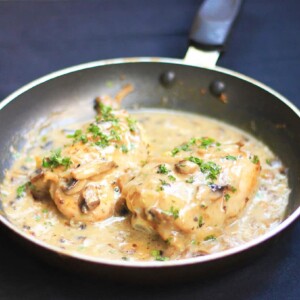 Chicken in Mushroom Sauce served in a black pan