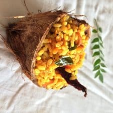 mango rice served in a coconut shell