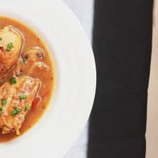 A picture of Chicken Stew served in a white bowl.