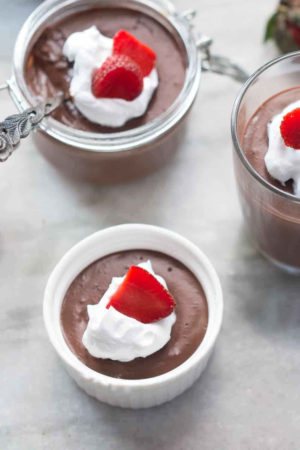 chocolate pudding served in small cups and bowls