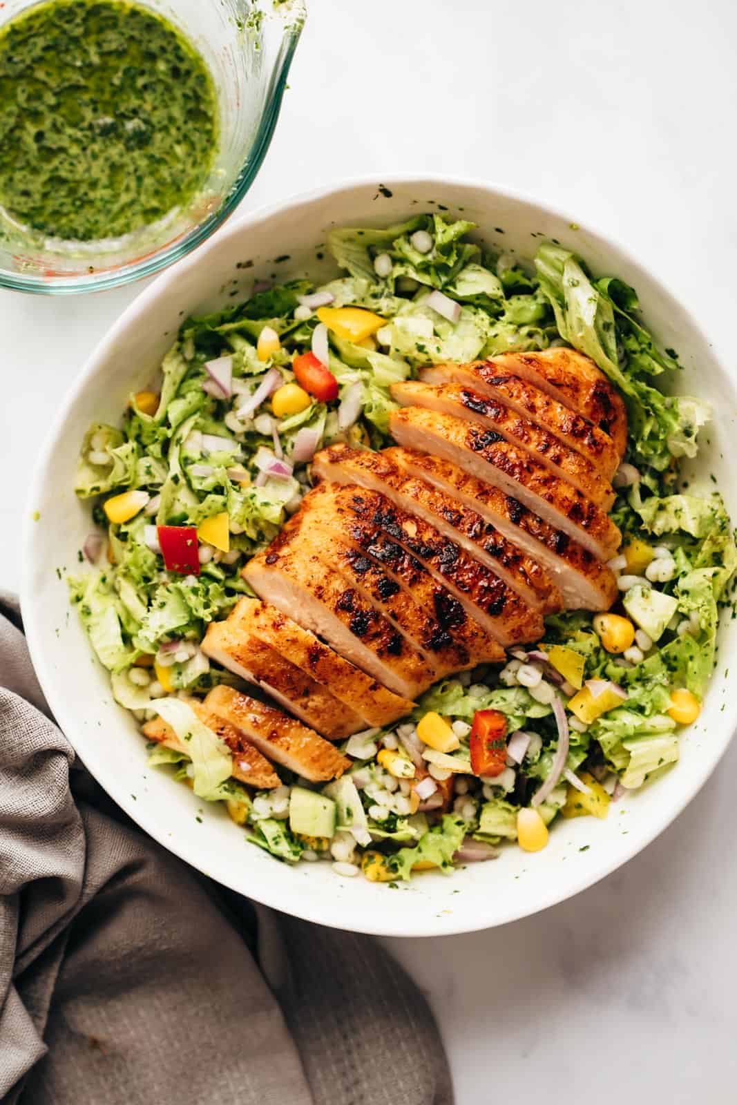 Barley Chicken Salad served in a grey bowl ready to eat
