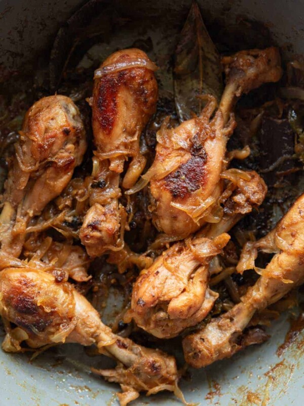 A picture of Quick Chicken with Caramelized Onions in a grey pan