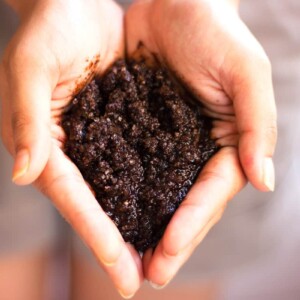 A picture of DIY Homemade Coffee Scrub in hands.