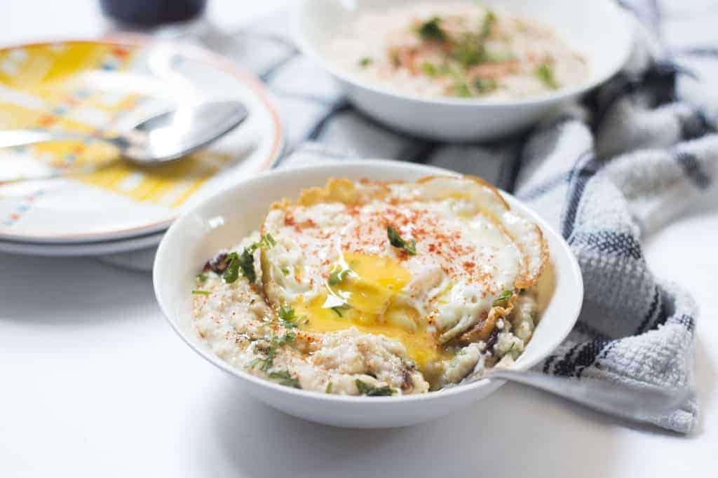 Garlicky Oats with Masala Fried Eggs is a quick, tasty and healthy breakfast option for when you are in a hurry, but still want some fueling up.