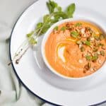 The dip garnished with pumpkin seeds
