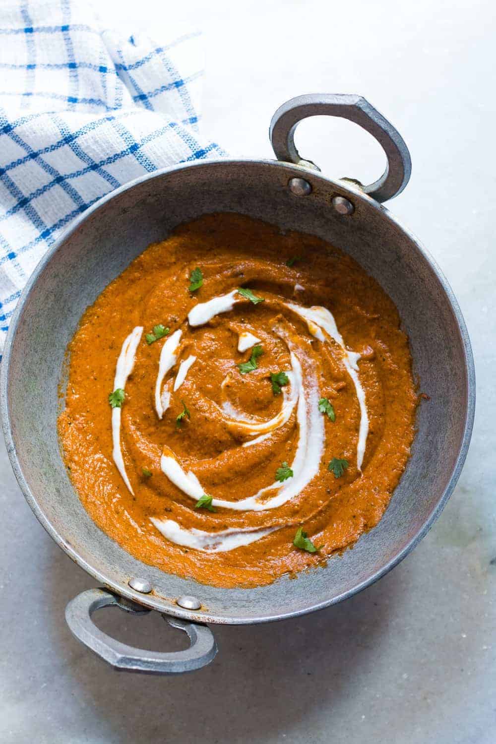 indian makhani gravy in a kahdai