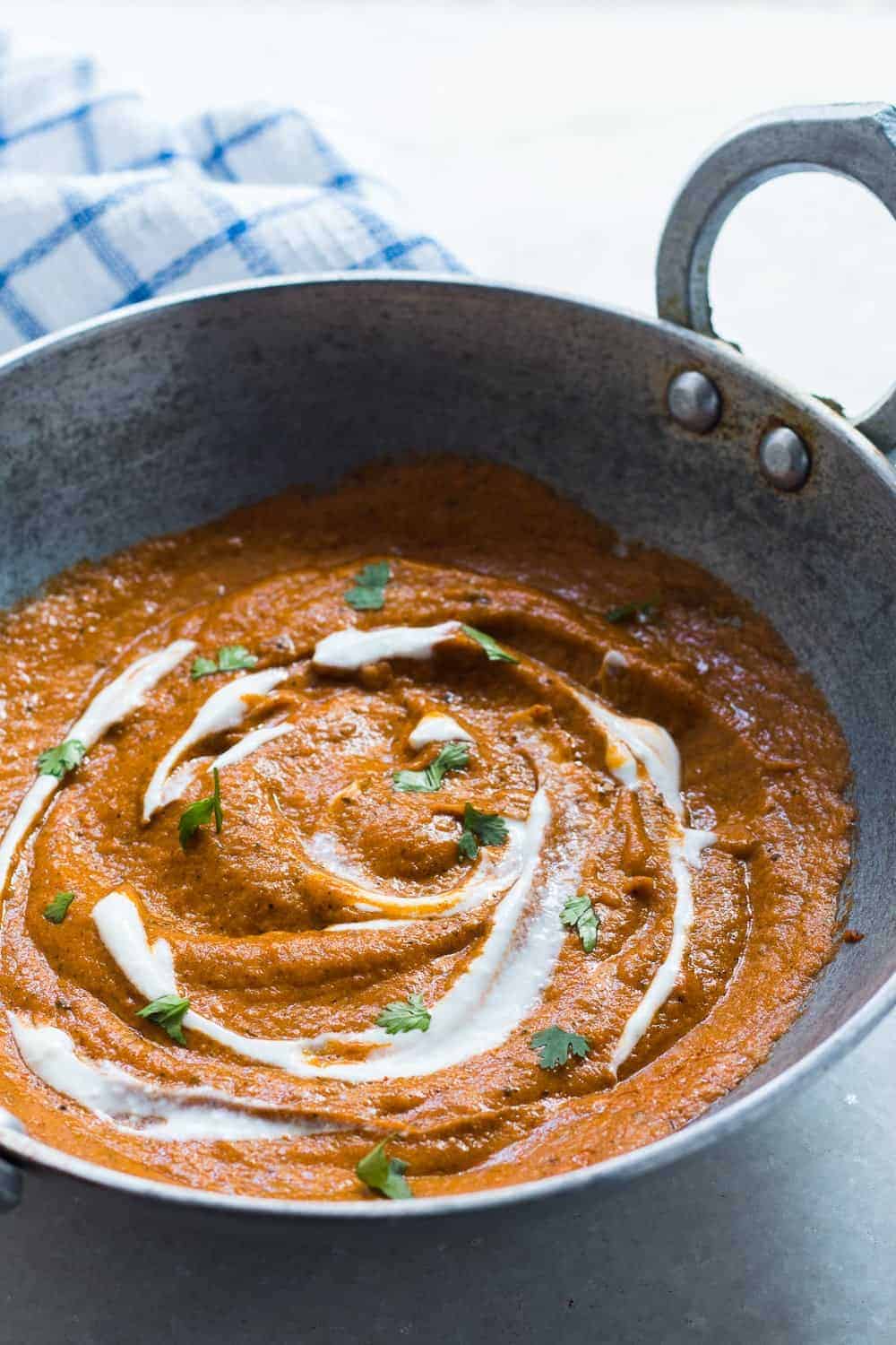 indian makhani gravy in a kahdai