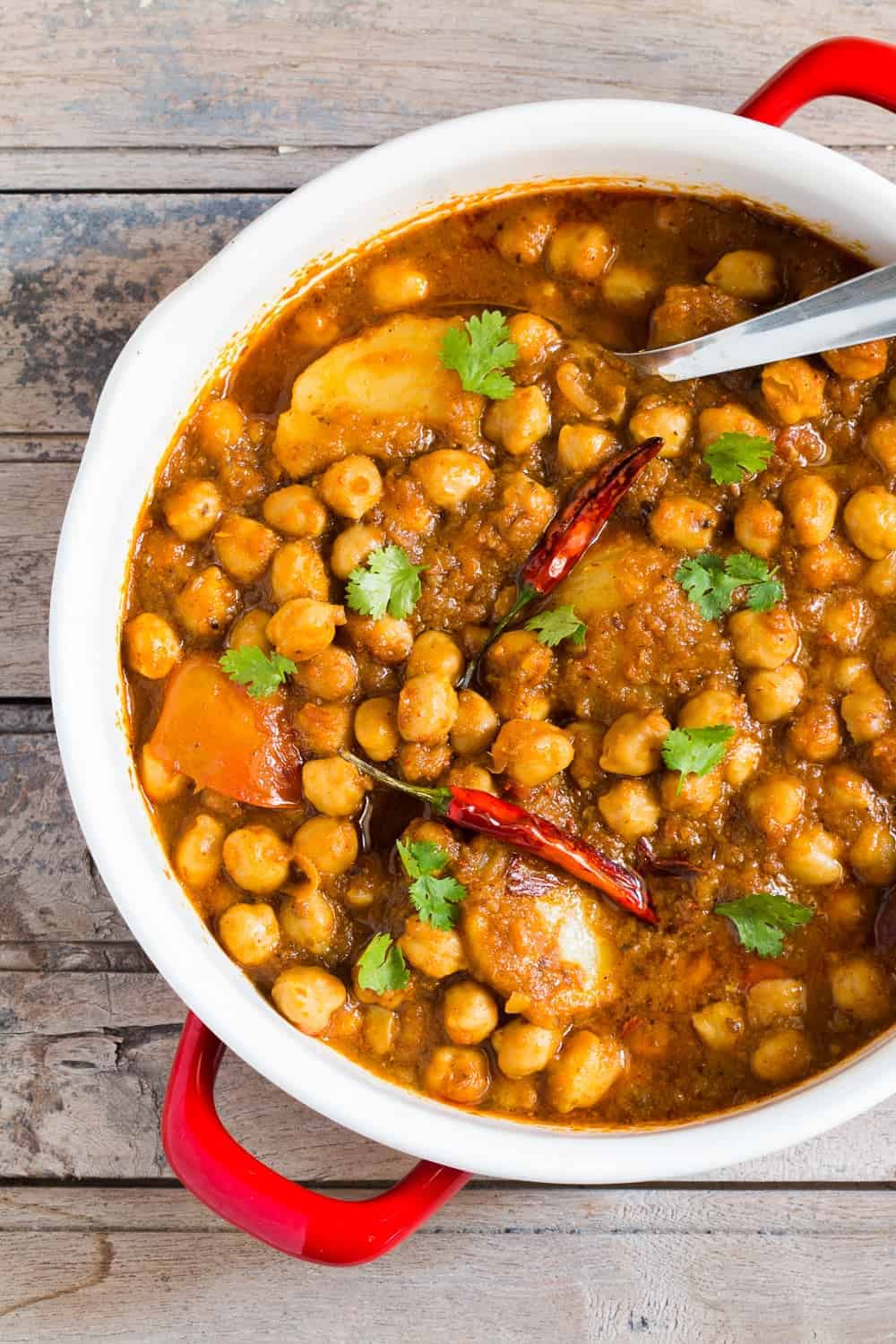 a close up of chana aloo masala