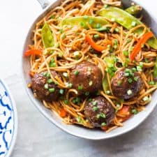 One Pan Veg Noodle and Manchurian Stir Fry served in a pan.