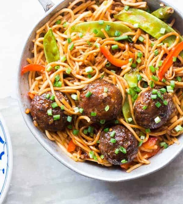 One Pan Veg Noodle and Manchurian Stir Fry served in a pan.