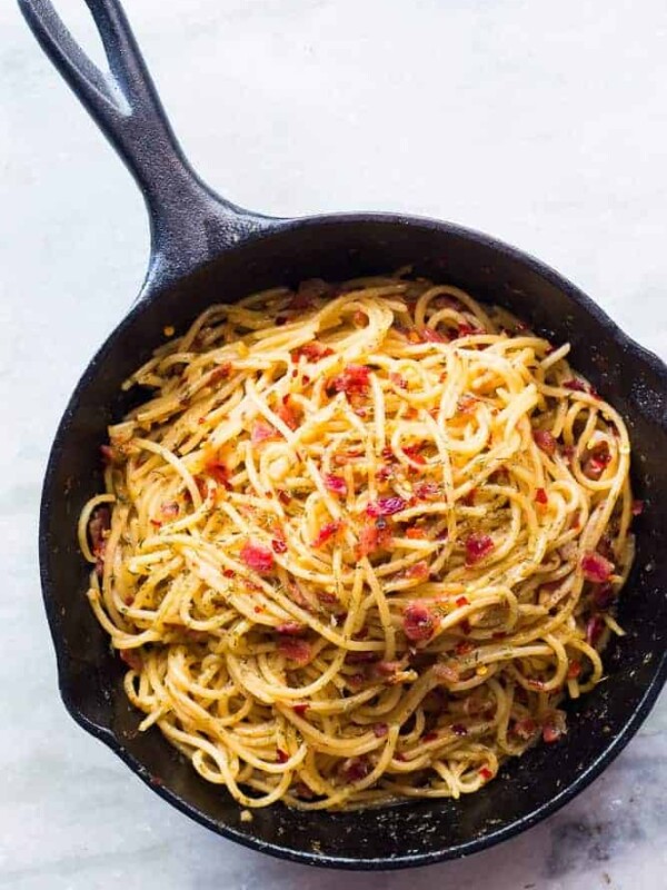 The spaghetti in a cast iron pan.