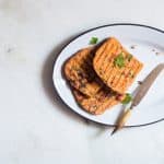 Masala french toast served from a large white plate.
