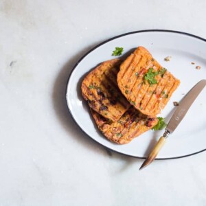 Masala french toast served from a large white plate.