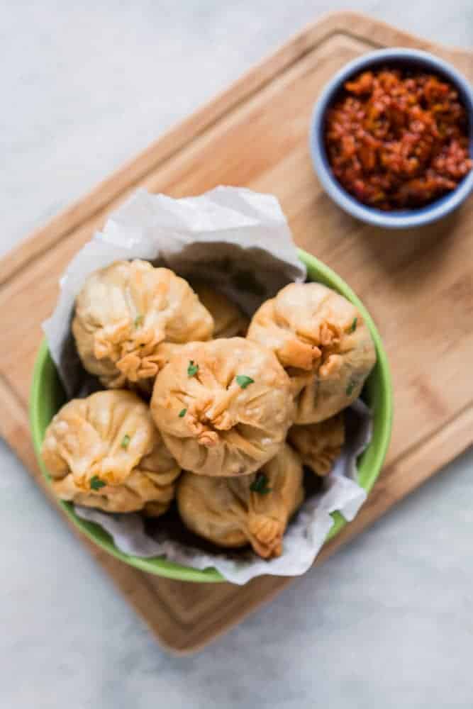 Vegetarian Chinese Potli Samosa Wontons Love samosas? These vegetarian chinese potli samosa wontons are going to blow you over! I used a lo mein noodle filling but you can just as easily use shrimp, cream cheese, even chocolate to make these wontons at home. Also includes recipe for homemade samosa wrappers!