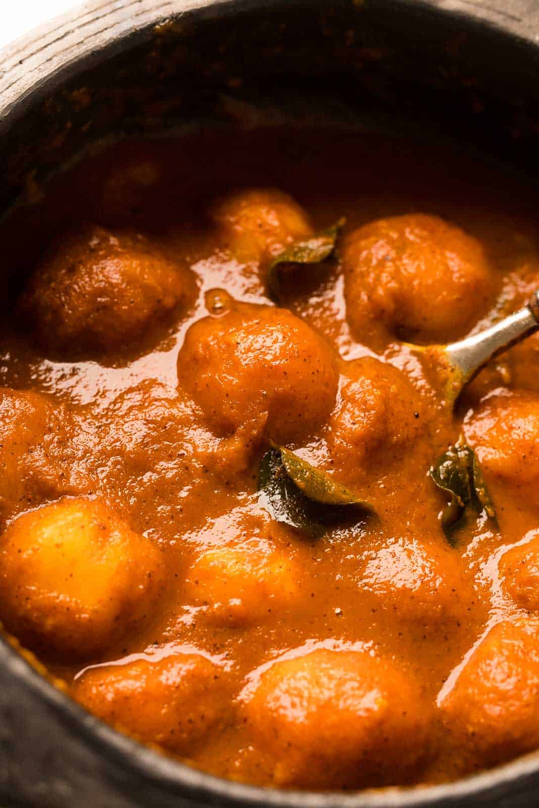 Mango Curry pictured in the clay mud pot that it was cooked in