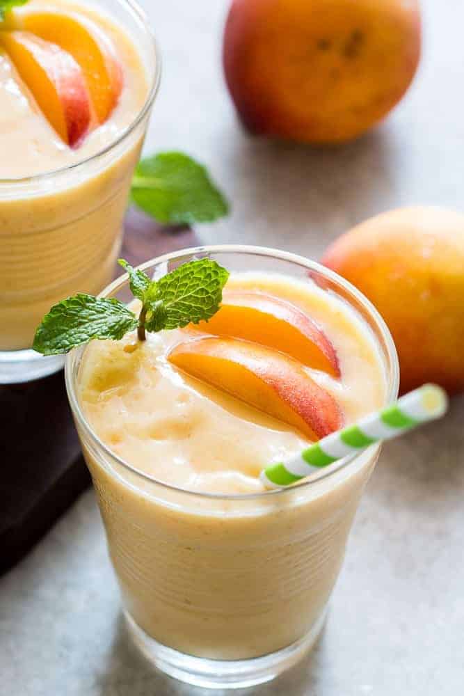 Healthy Vegan Frozen Peach Mango Smoothie This healthy peach mango smoothie is vegan and the frozen fruit makes it thick and dessert like! Also get my top tips for making the best smoothies!