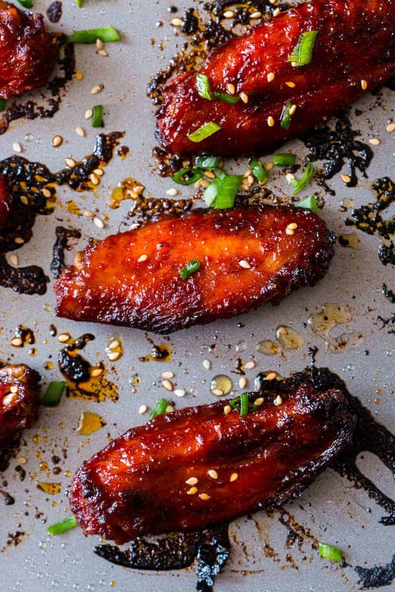 Spicy, crispy, full of umami and insanely addictive Korean baked gochujang chicken wings. You'll never go back to having wings any other way!