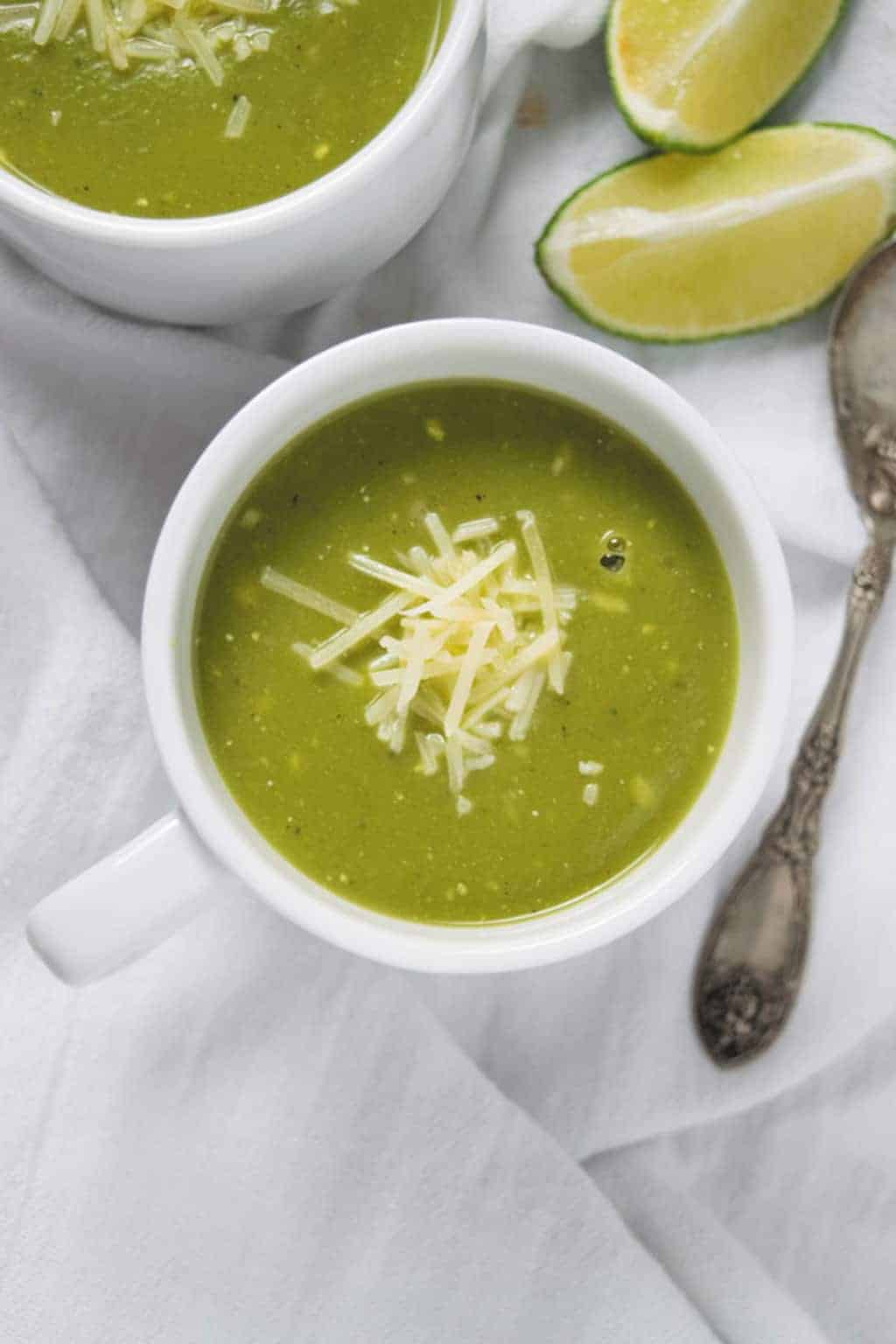 pressure cooker zucchini basil soup served in white cups