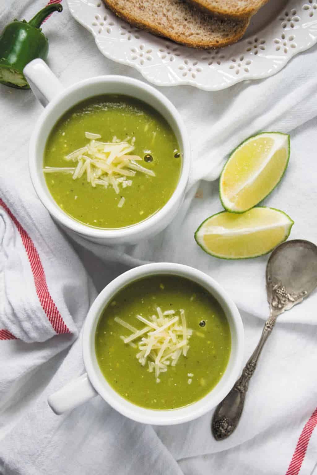 pressure cooker zucchini basil soup served in white cups