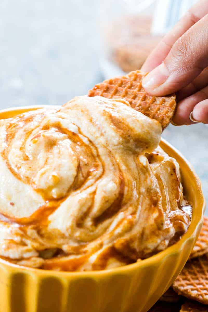 This caramel pumpkin pie cheesecake dip is a breeze to make and the perfect fall holiday appetizer or dessert. We use whipped cream instead of Cool Whip for more volume and flavour. That's one less processed ingredient for you to worry about, which makes this slightly healthier too. Serve it with graham crackers or like we did - waffle bites!