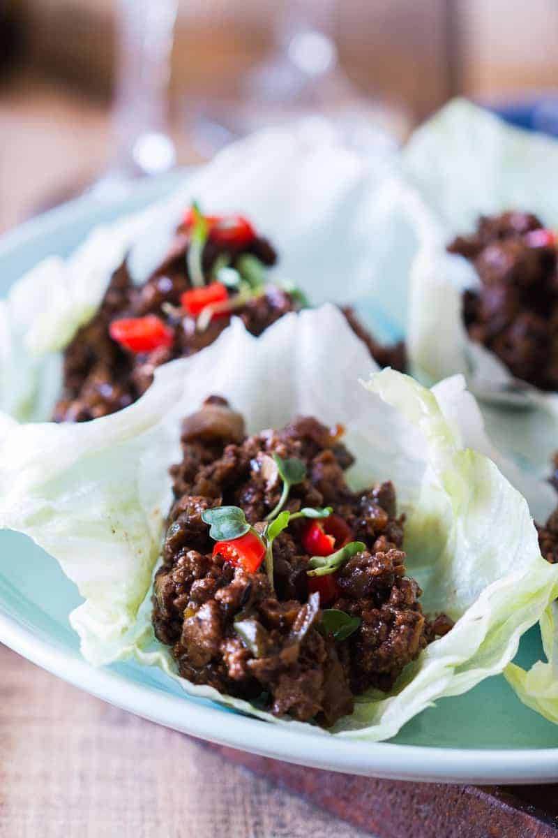 Easy, healthy and insanely delicious stir fried black bean chicken lettuce cups are perfect when you want dinner in 30 mins. Just 5 main ingredients in this gluten free recipe.