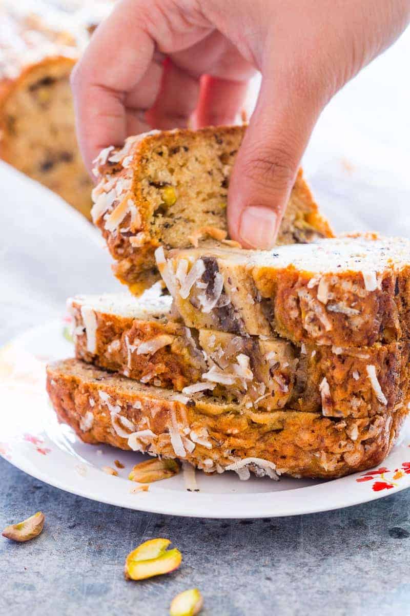 Quick Coconut Pistachio Banana Bread you only need a few simple ingredients to make this healthy and super quick coconut pistachio banana bread. Moist, nutty and the perfect holiday snack.