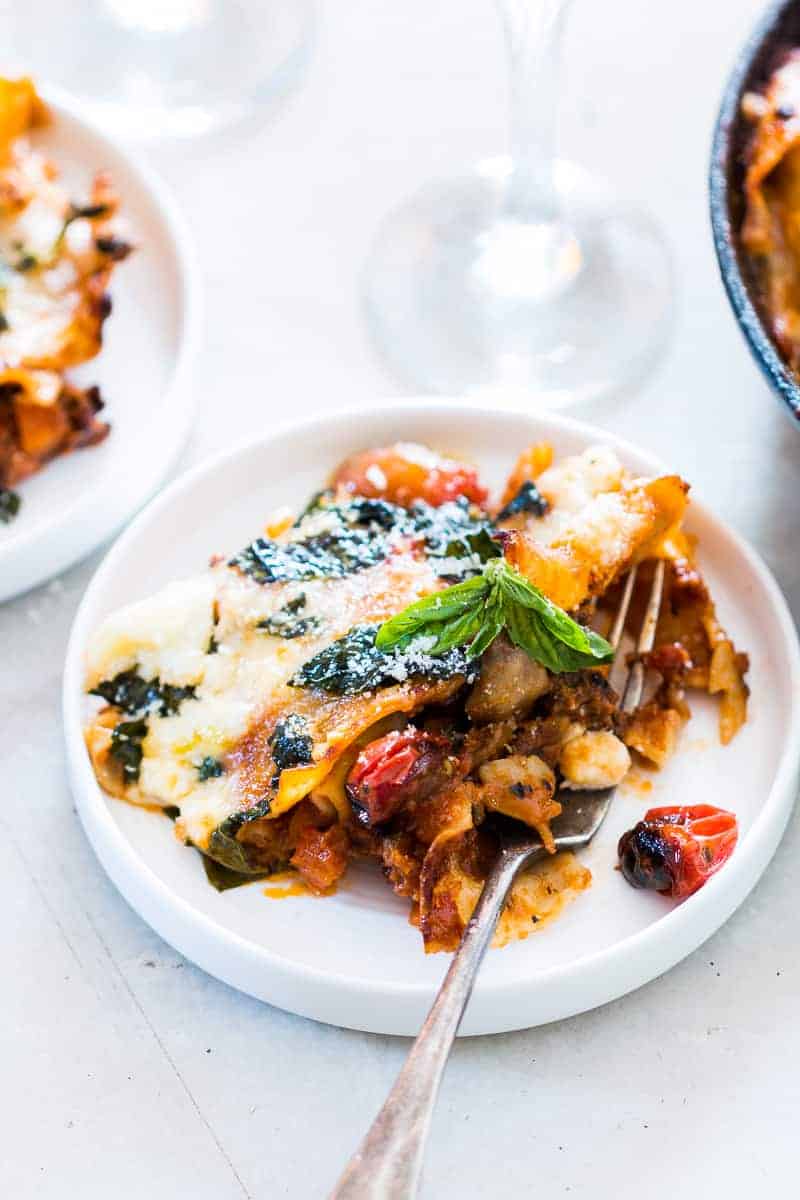 Easy 30 minute vegetarian lasagna skillet is fast, easy, healthy, loaded with veggies and still has carbs to keep us happy. You could add ricotta, cottage cheese to the recipe, or even make it with bow tie pasta or ravioli if you don't have lasagna sheets. Love busting out my cast iron for this one! #pasta #recipe #lasagna #fast #dinner #onepot #vegetarian Easy 30 minute vegetarian lasagna skillet is fast, easy, healthy, loaded with veggies and still has carbs to keep us happy. You could add ricotta, cottage cheese to the recipe, or even make it with bow tie pasta or ravioli if you don't have lasagna sheets. Love busting out my cast iron for this one!
