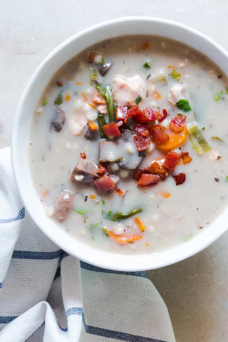 This creamy slow cooker chicken barley soup is made healthier by replacing rice or noodles with barley. It's easy, uses whole ingredients and is perfect for your crockpot. Pure comfort food! YUM!