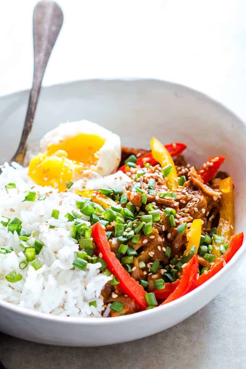 Easy Slow Cooker Korean Pork Bulgogi recipe that can be made in a crockpot and has spicy gochujang in it's marinade. Healthy, yummy stew that's perfect over rice for dinner!