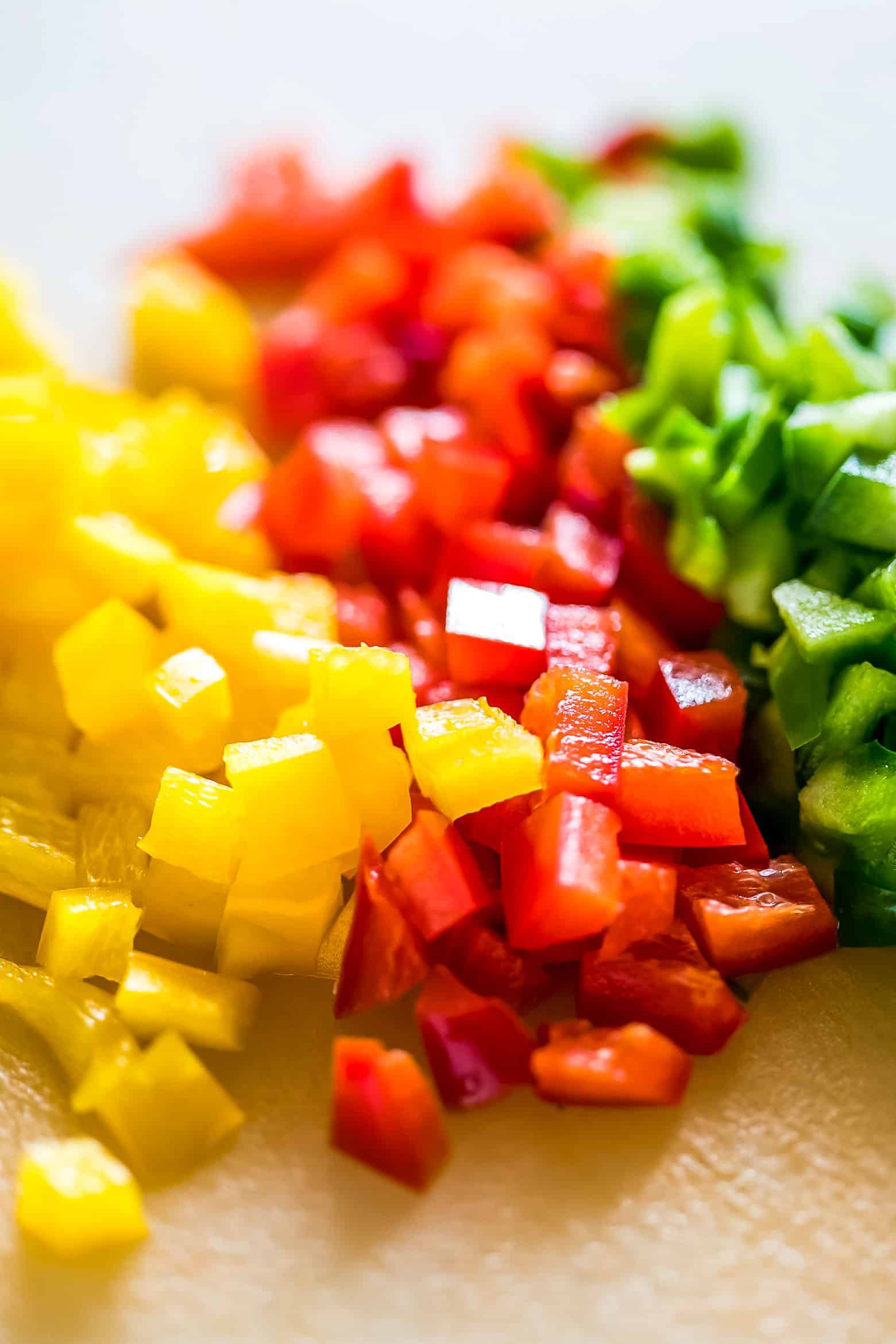 Low Carb Mexican Cauliflower Rice is a healthy, paleo friendly, keto friendly, vegan side dish recipe that is bursting with mexican flavours and ready in 30 minutes!
