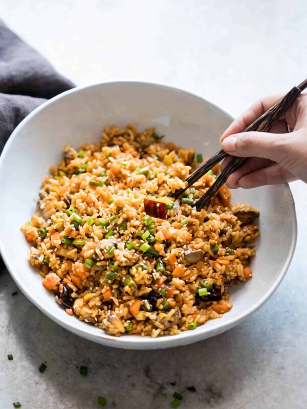Schezwan Fried Rice from leftover rice served in a white bowl.