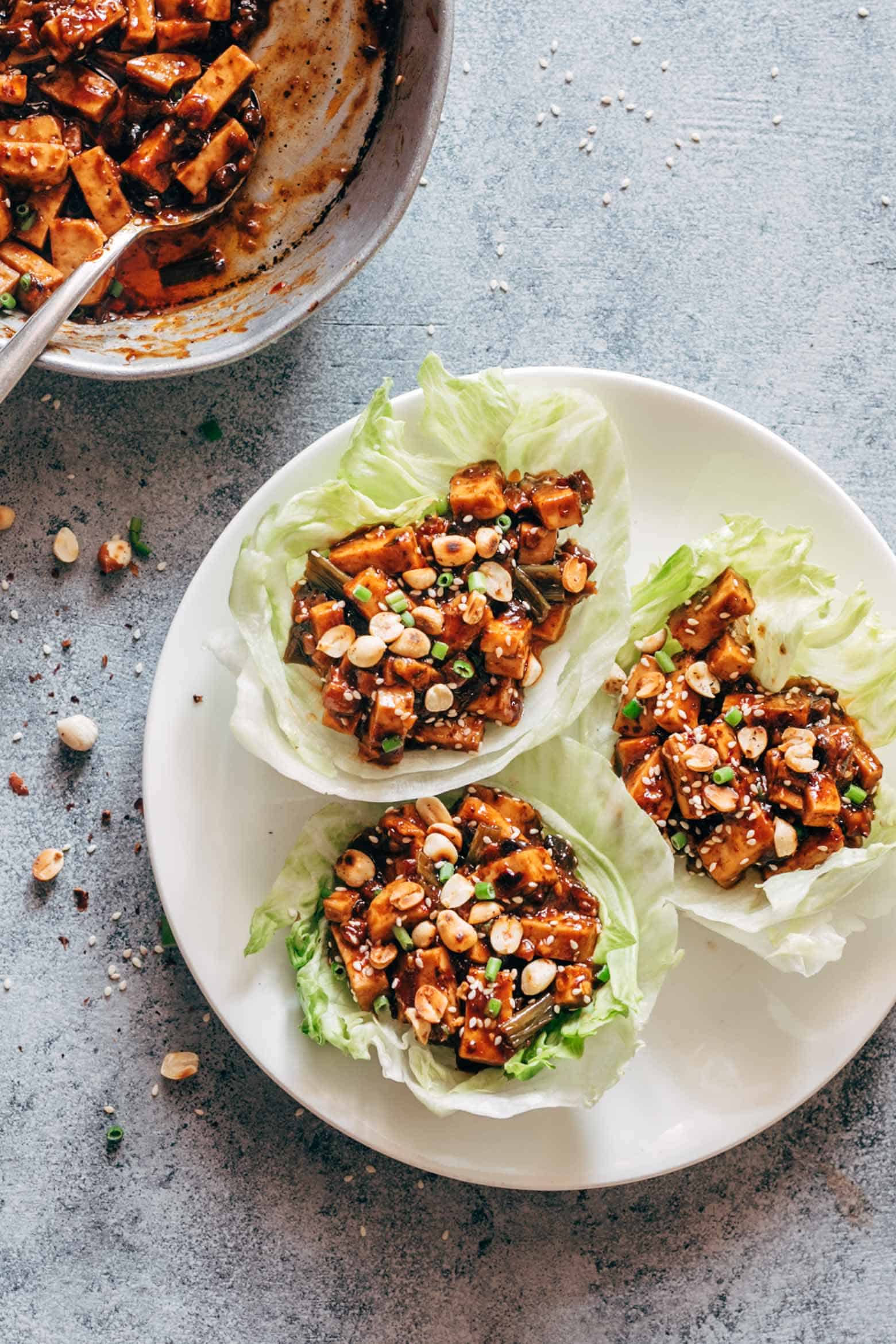 These vegetarian mapo tofu lettuce wraps double up as appetizer and dinner and use shiitake mushrooms instead of pork for that same great taste! Vegan and Gluten Free too.