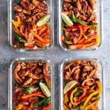 Chicken fajita with cilantro lime quinoa and grilled veggies in glass containers.
