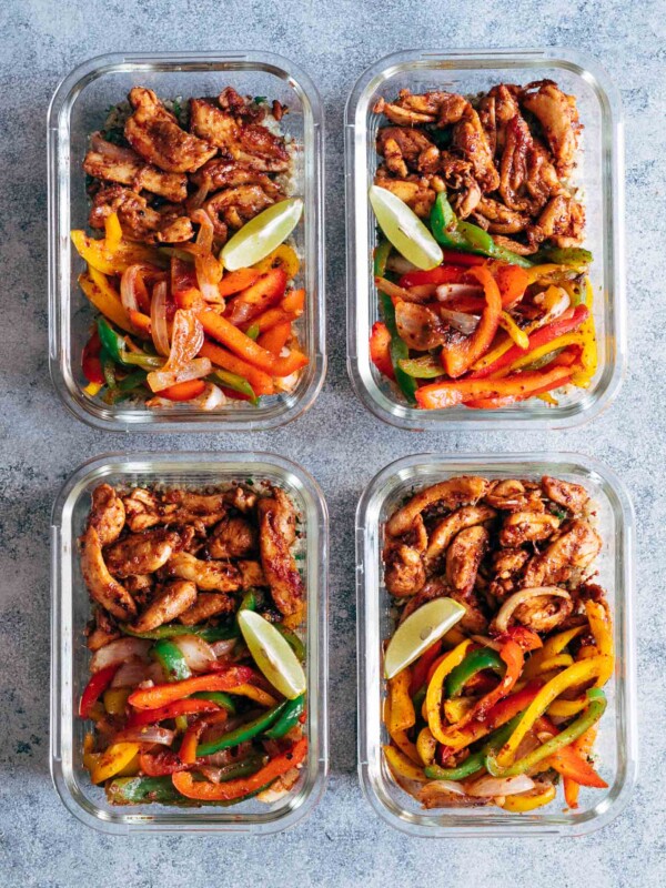 Chicken fajita with cilantro lime quinoa and grilled veggies in glass containers.