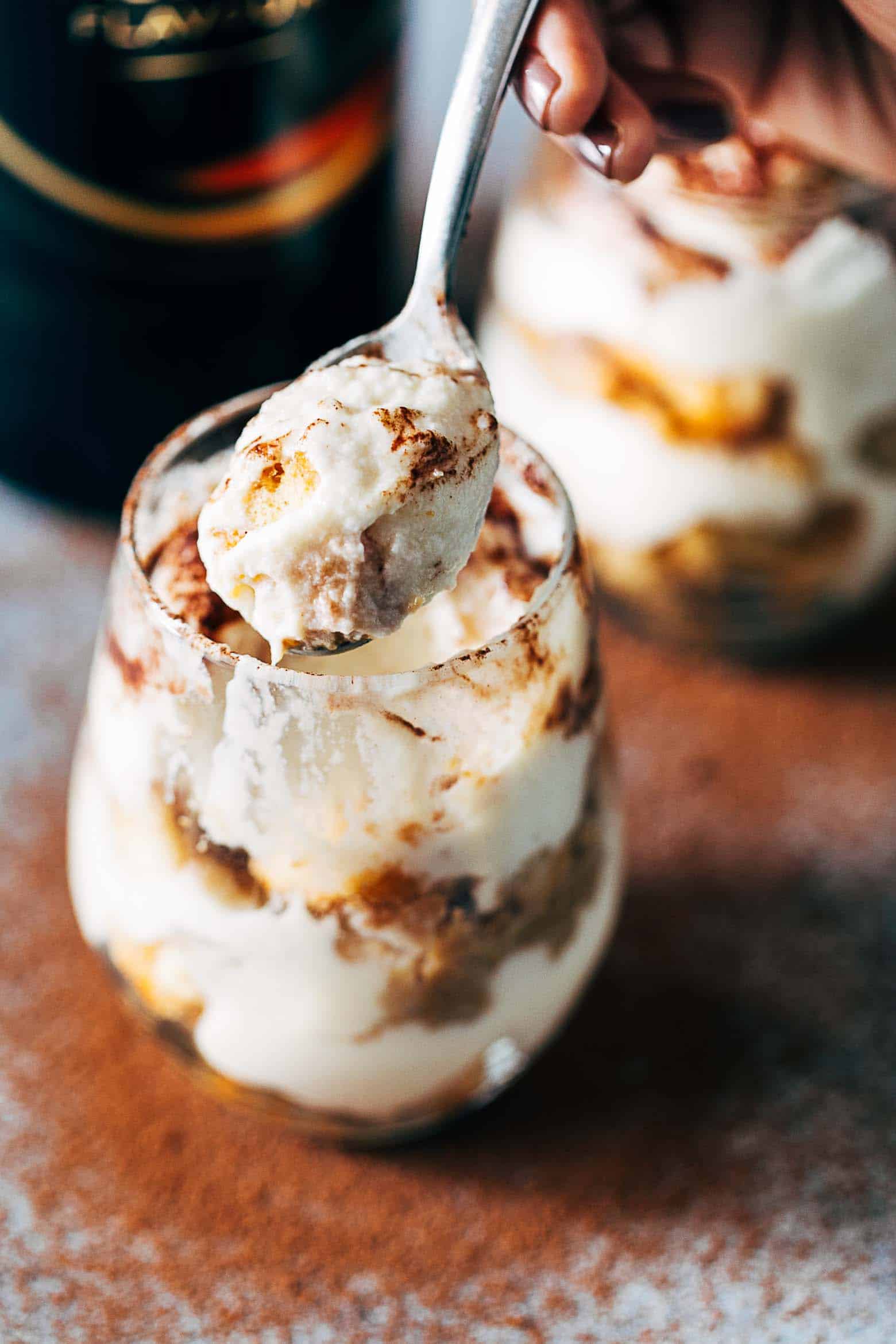 Easy Baileys Tiramisu Trifle Cups are a fun take on the classic Italian Tiramisu recipe. Made eggless, this make-ahead eight ingredient dessert is the perfect summer recipe.
