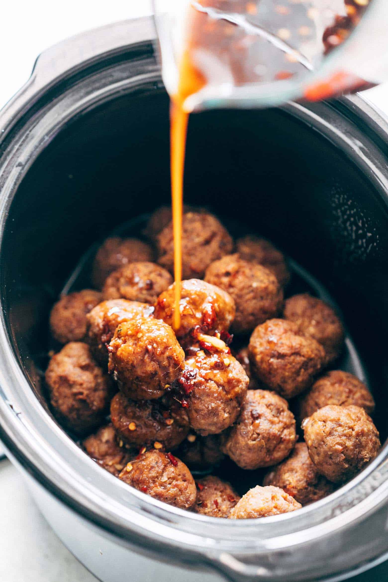 Asian inspired slow cooker teriyaki meatballs with pineapple are super easy, low carb and can be made in your crockpot. Juicy, succulent, these teriyaki pineapple meatballs can also be baked in the oven.