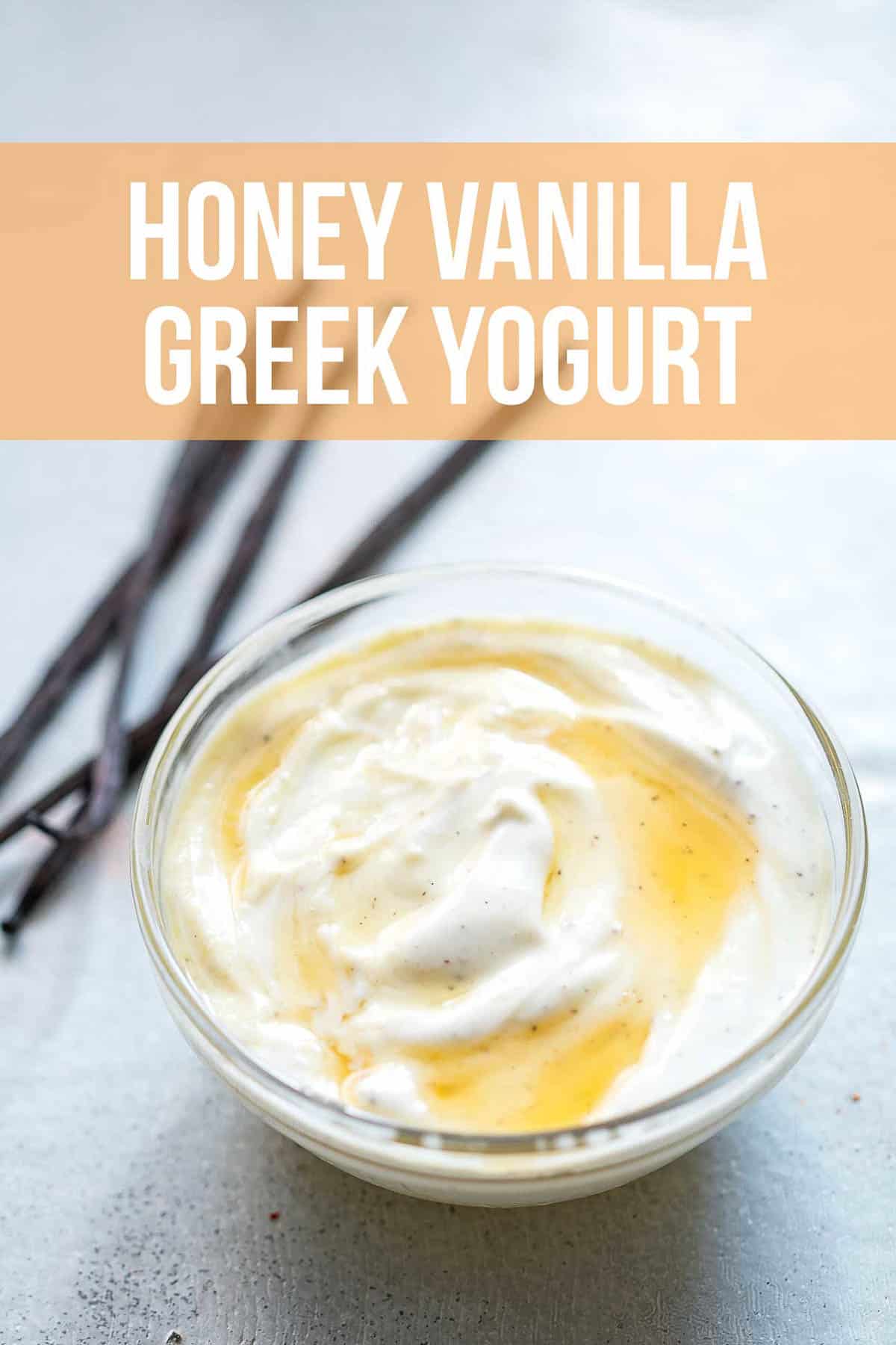 Honey vanilla greek yogurt drizzled with honey with vanilla pods on the side, served in a bowl