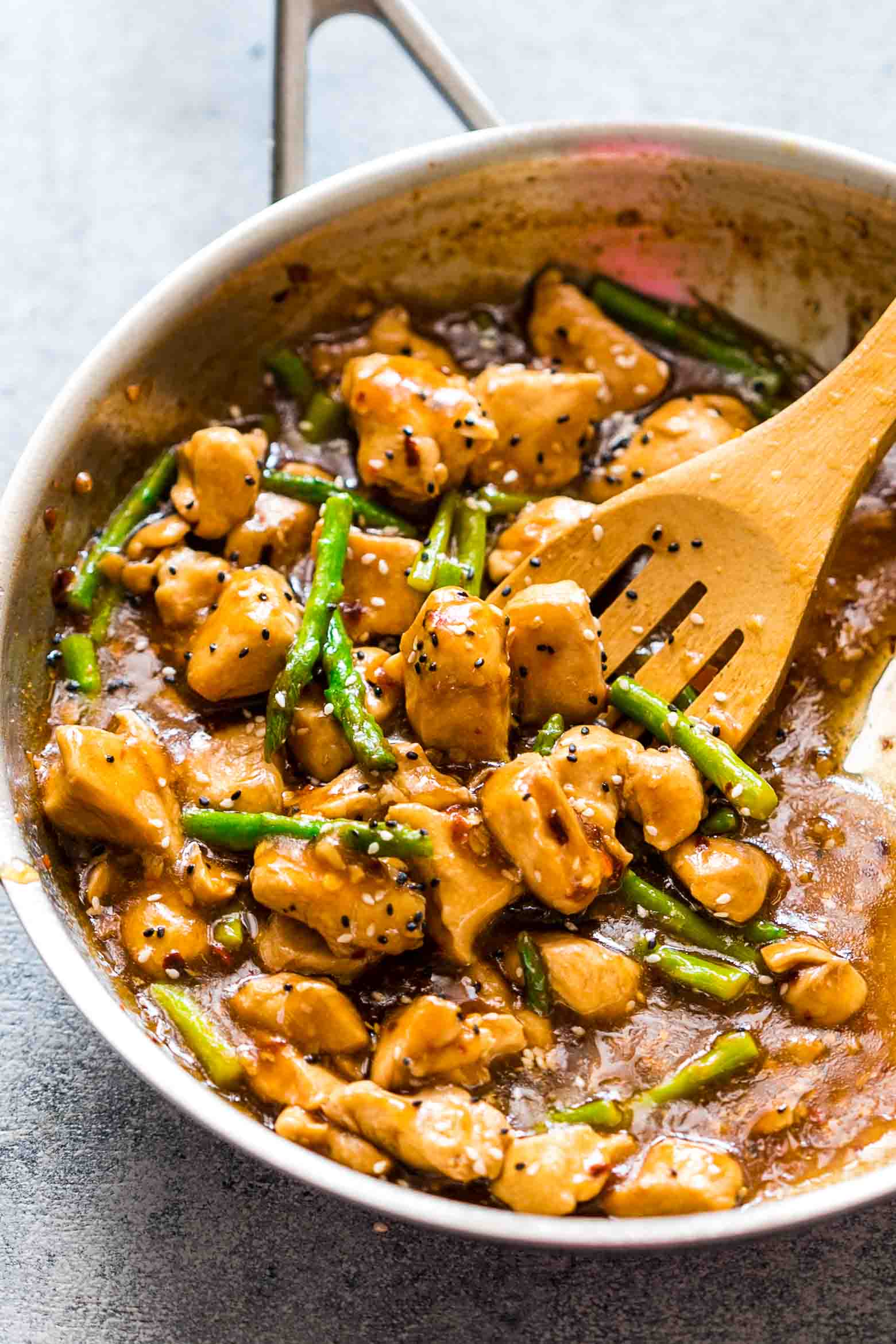 Easy lemon ginger chicken asparagus stir fry is a quick, 30 minute asian recipe that's sure to be a hit with the family. It's low carb and can gluten free too so you can enjoy it guilt-free!