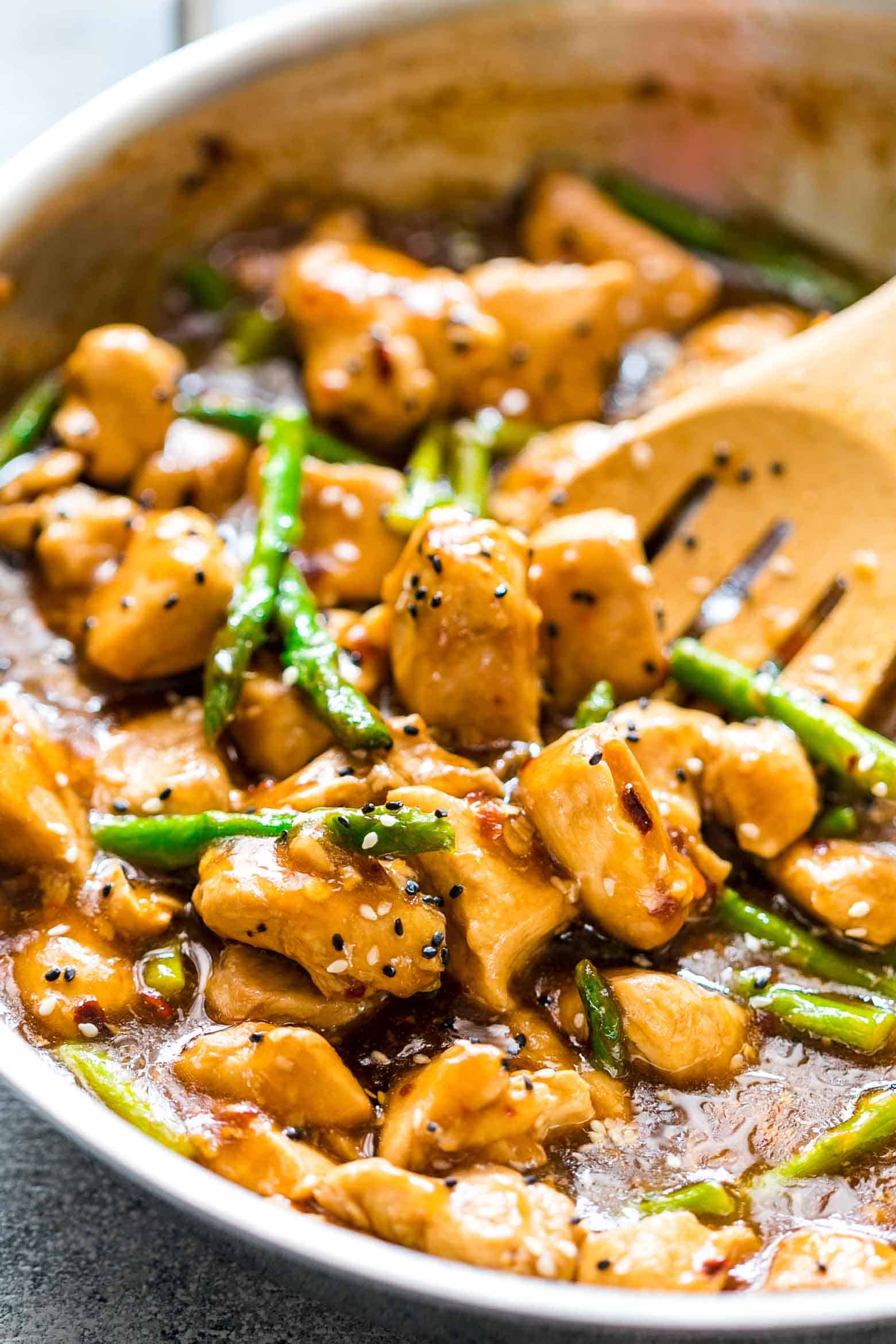 Easy lemon ginger chicken asparagus stir fry is a quick, 30 minute asian recipe that's sure to be a hit with the family. It's low carb and can gluten free too so you can enjoy it guilt-free!