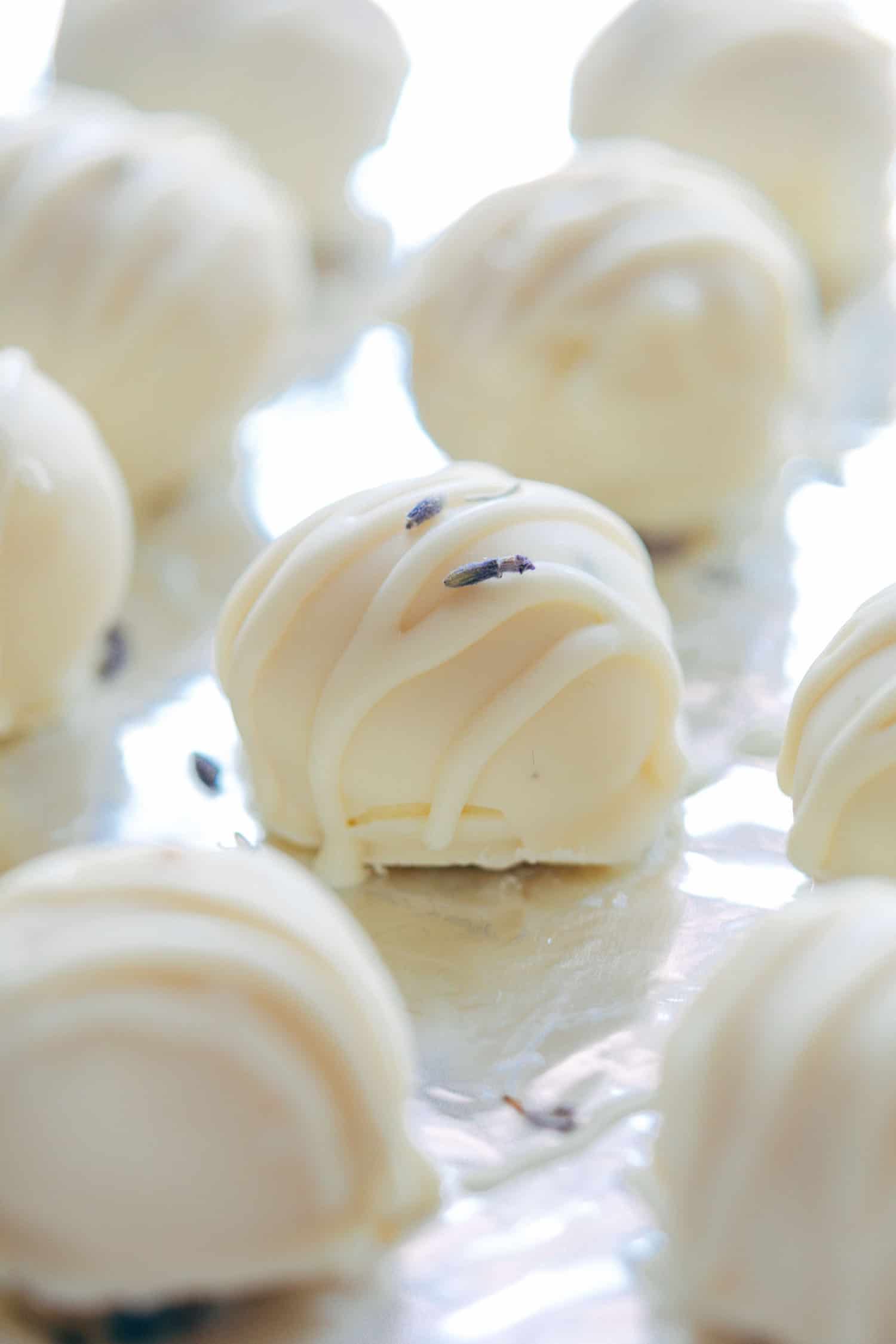 Lavender white chocolate truffles are fragrant, creamy white chocolate bites that are perfect for the festive season and holidays! Use them to serve as mini desserts, or for gifting.