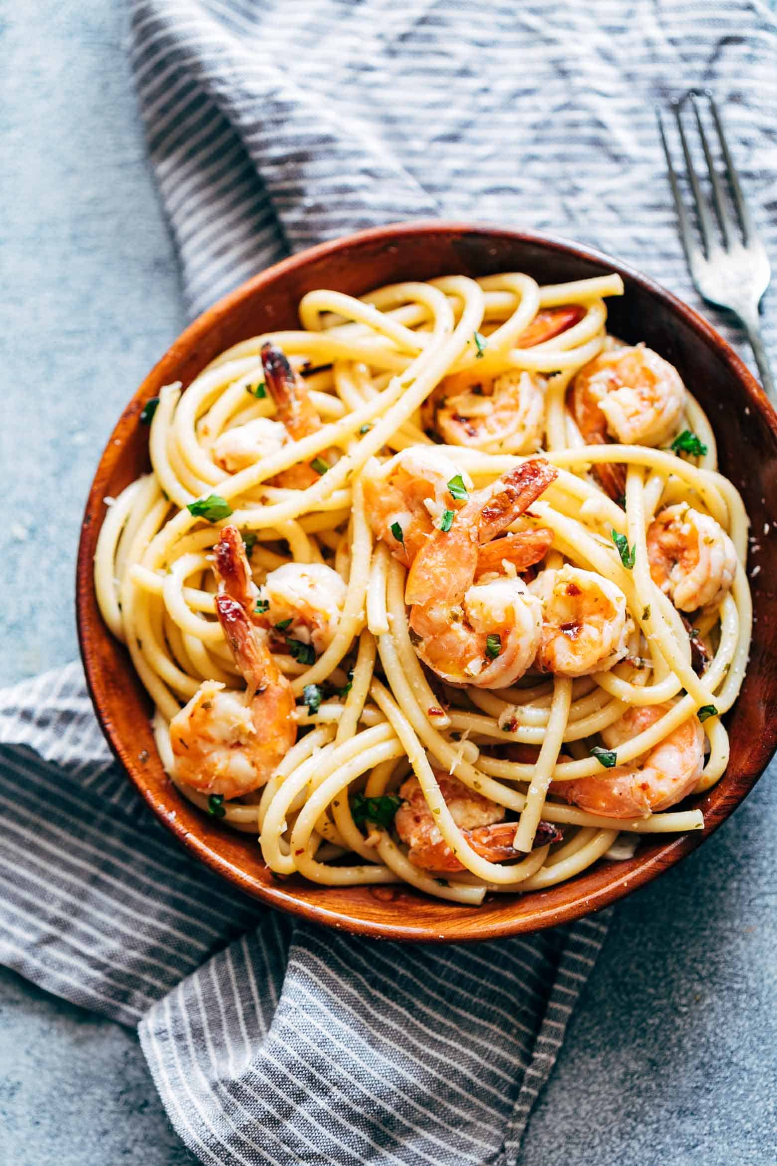 Shrimp Spaghetti Aglio Olio is a 5 ingredient pasta recipe (shrimp, olive oil, garlic, peperoncino or chilli flakes and parsley) thats ready in 20 minutes and has the easiest, most delicious pasta sauce you'll ever make!