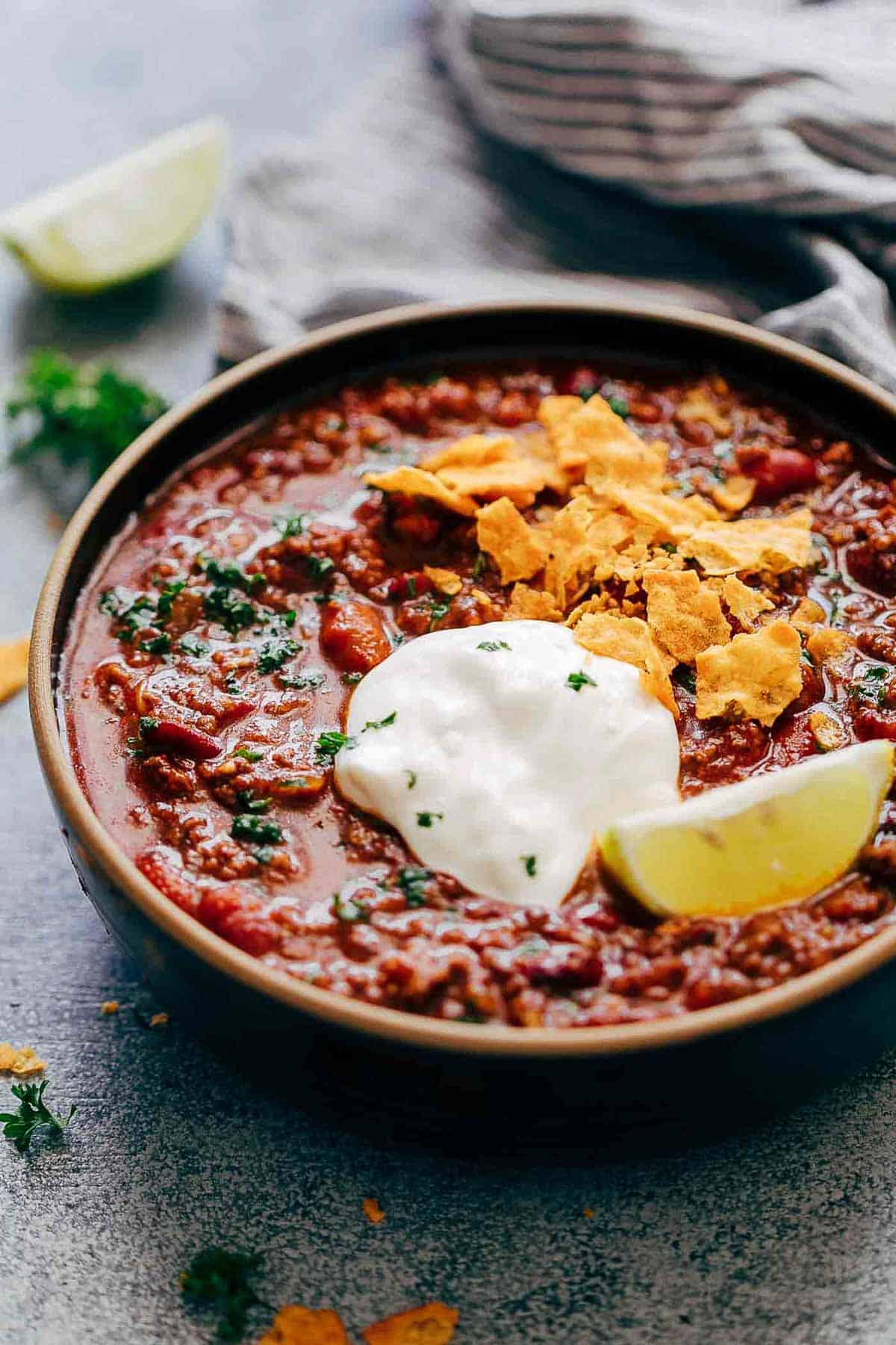 Instant Pot Chipotle Chili is the easiest and fastest way to make chili at home. It's spicy, homemade, comfort food that will keep you warm and makes for a great one pot family dinner. Leftovers taste even better the next day!