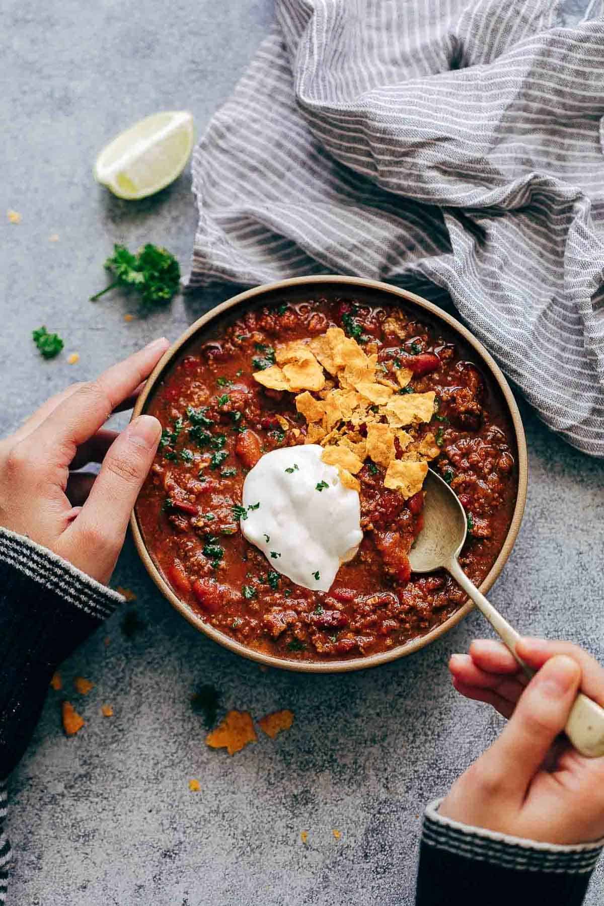 Instant Pot Chipotle Chili is the easiest and fastest way to make chili at home. It's spicy, homemade, comfort food that will keep you warm and makes for a great one pot family dinner. Leftovers taste even better the next day!