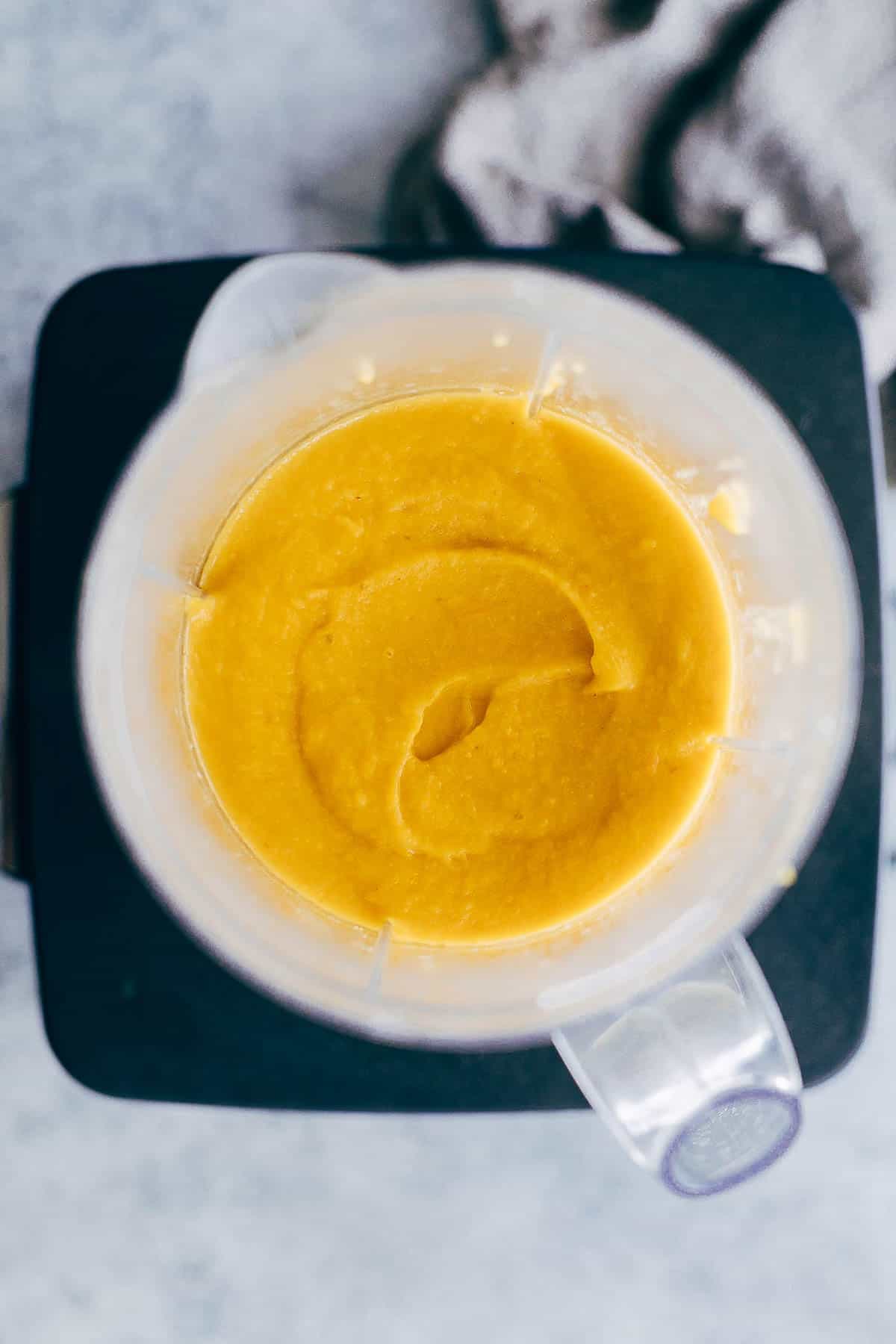This Thai Butternut Squash Sweet Potato Bisque is perfect for cold winter days - super thick and creamy soup with a hint of heat that will keep you warm and cozy. It has all the fall flavours and ingredients - onions, carrots, butternut squash, sweet potato, thai curry paste and coconut milk.