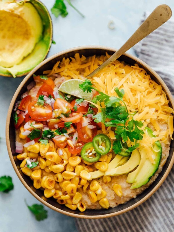 This Mexican oatmeal bowl is the healthier version of a Mexican breakfast bowl. The oatmeal is seasoned with all the spices that go into your favorite taco, and then topped with salsa, corn, avocado, jalapenos and cheddar. Super simple to make but you’ll feel like a king when you dig into this!