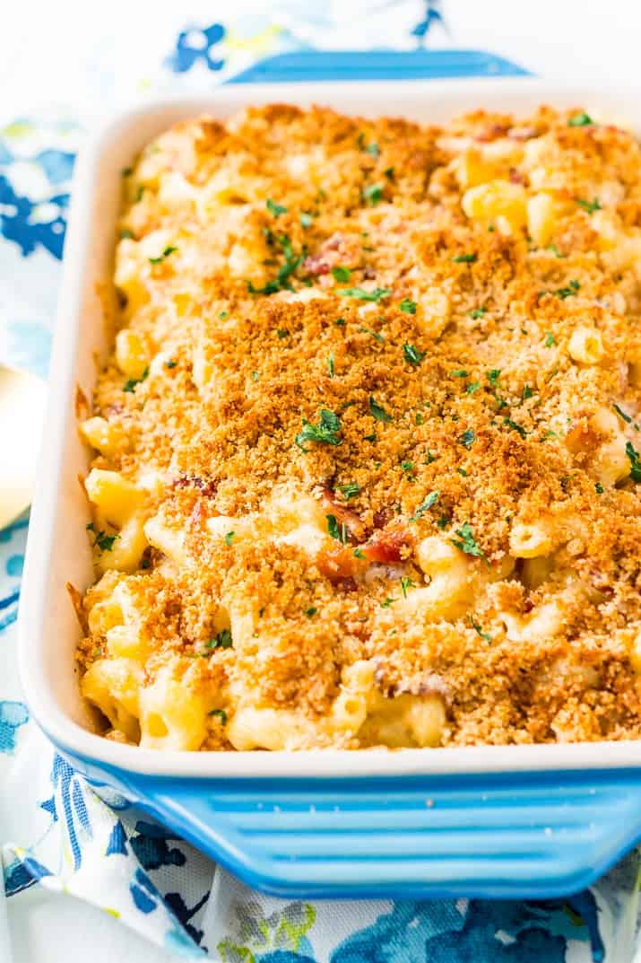Three cheese bacon mac and cheese in a blue baking dish straight out of the oven