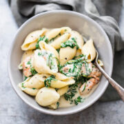 Creamy chicken florentine pasta served in a grey bowl