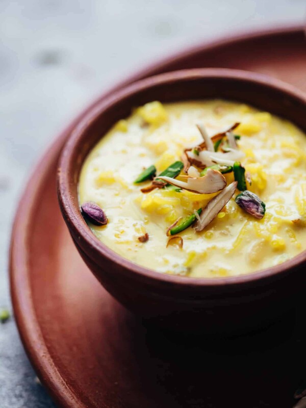Closeup of rice kheer served in a mud pot