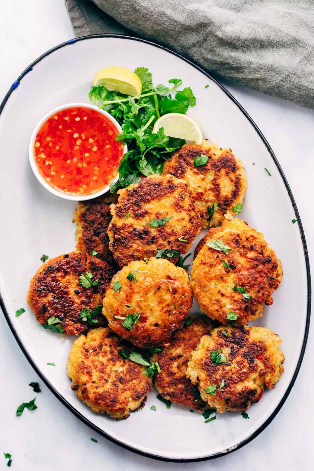 Easy Thai Shrimp Cakes served on a platter with thai sweet chilli sauce