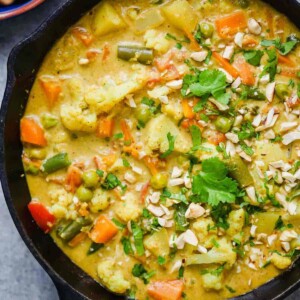 Vegetable Korma Curry straight from the stove served in a cast iron pan